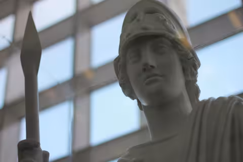 A plaster statue of Minerva, the Roman goddess of wisdom and UAlbany's symbol of excellence.