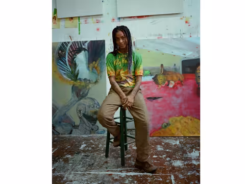 Artist mosie romney in their studio