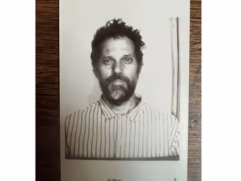 Photobooth photo of poet Kostas Anagnopoulos