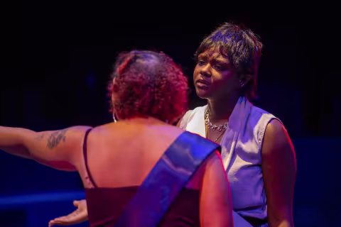 Two actress perform in a UAlbany theatre production of "The Drunken City"