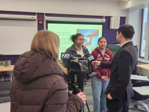 Anthony Krolikowski of WTEN interviews students from a classroom inside the Catskill building.