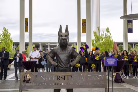The new Damien statue stands tall on the Academic Podium.