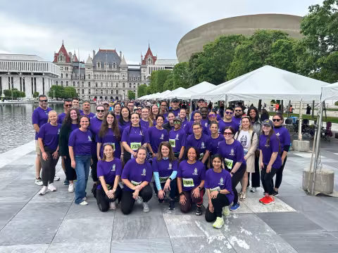 UAlbany's 62 participants pose for a photo at the 2026 CDPHP Workforce Challenge on the Empire State Plaza in downtown Albany.