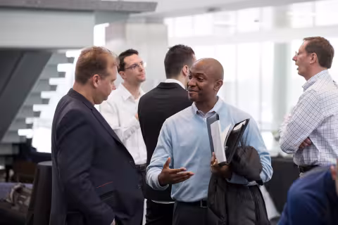 Employers networking at Cyber Job Fair
