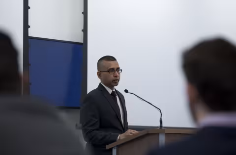 Sanjay Goel presenting at cybersecurity event 