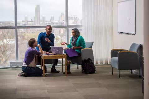 Graduate students meet at the Health Sciences Campus.