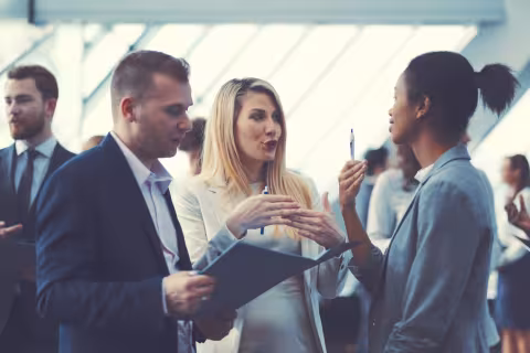 Group of young professionals having a discussion