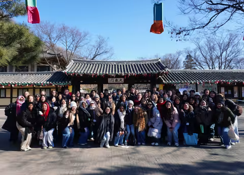 A group of Fulbright awardees pose for a group picture in Korea.