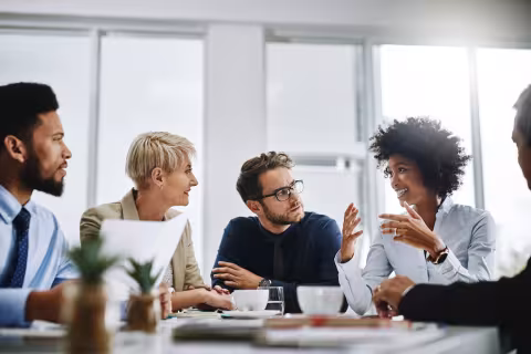 A group of professionals having a discussion.