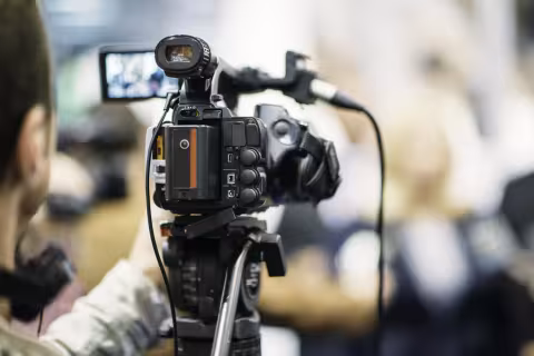 Person using a video camera