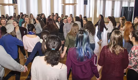 Area high school students studying the French language learn traditional French folk dance at the 2017 Francophone Day celebration in the Campus Center Ballroom.  Photos: Mark Schmidt