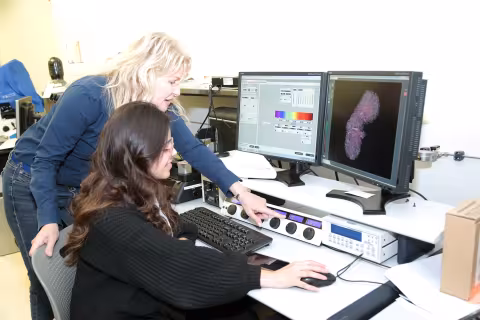 Janet Paluh, left, and Maria Paredes-Espinosa in Paluh's lab.