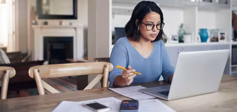 Woman studying on a laptop