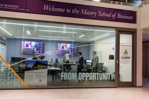 A view of the investment suite inside the Massry School of Business