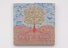 A art piece hangs on a wall, it is a canvac with an abstract of a tree made up of lines and colors on it.