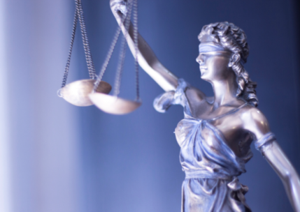 Lady Justice holds weighing scales