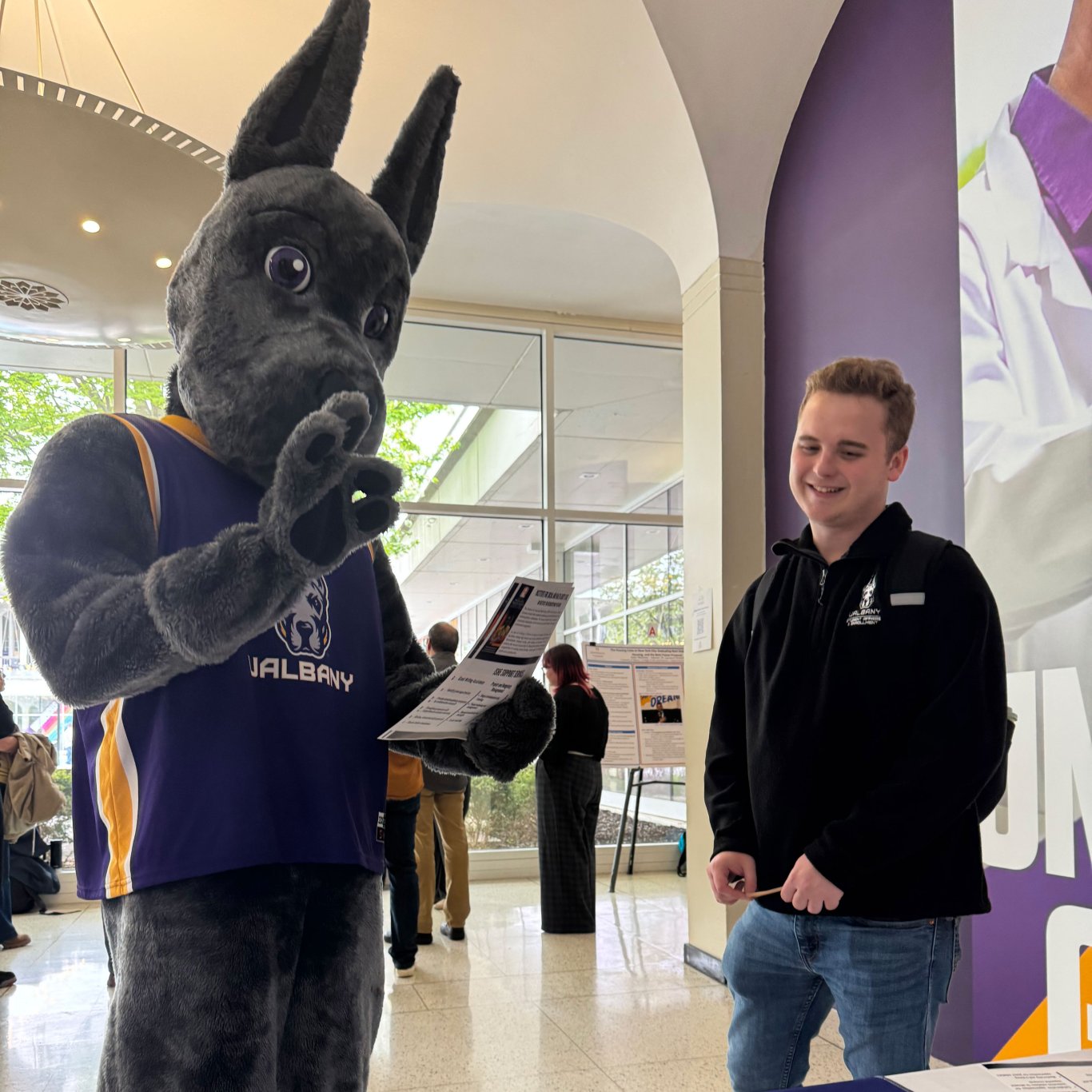 UAlbany's Damien mascot and attendee.