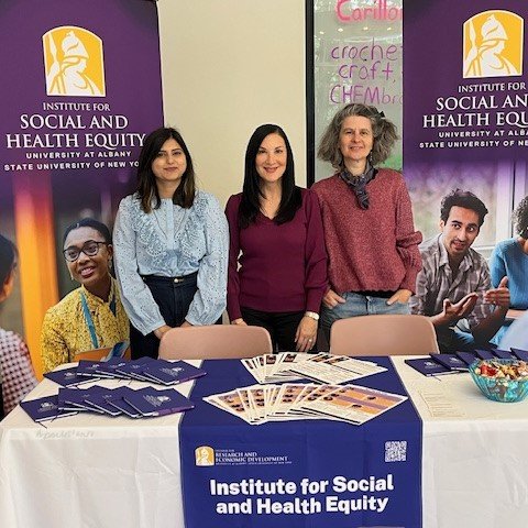 An image of Debbie, Valerie and Saloni from ISHE at UAlbany Showcase 2026.