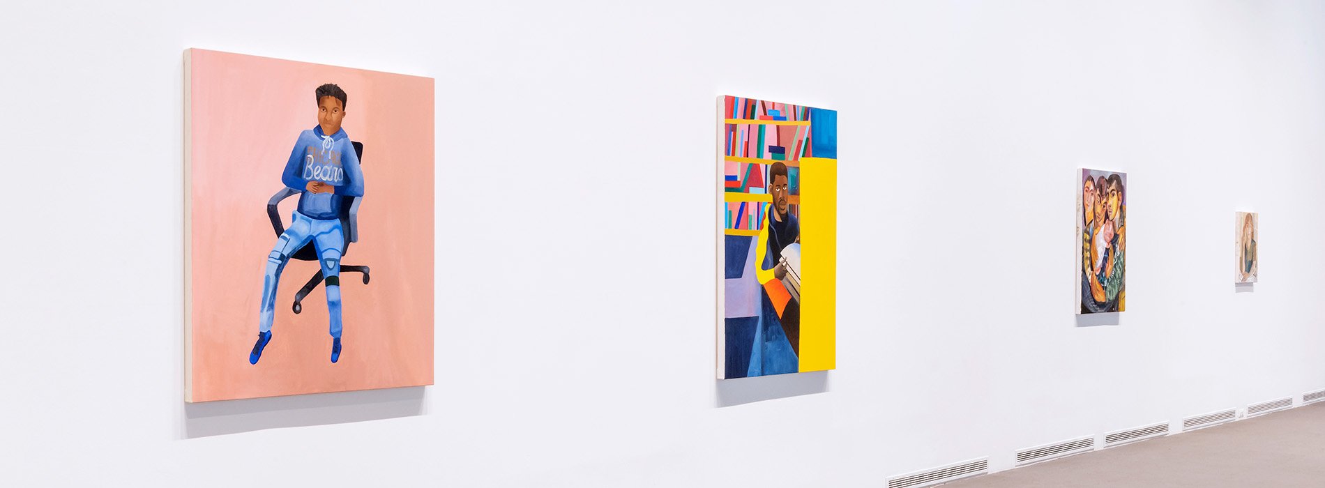 four paintings on a white wall the first of a man in a chair and the rest are barely visibile at this angle