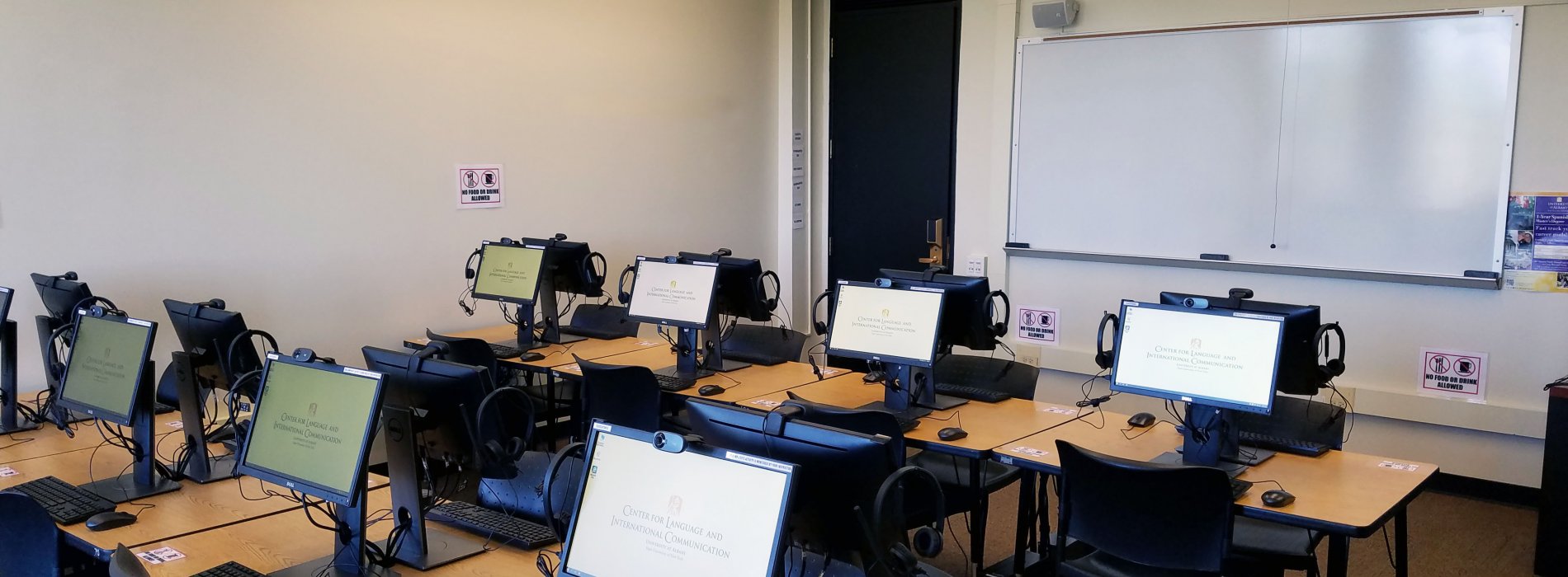 Language laboratory with computers turned on.