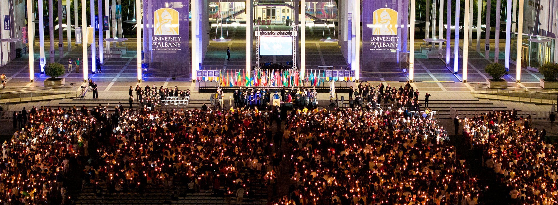 Students gathered in front of the entry way for candlighting.