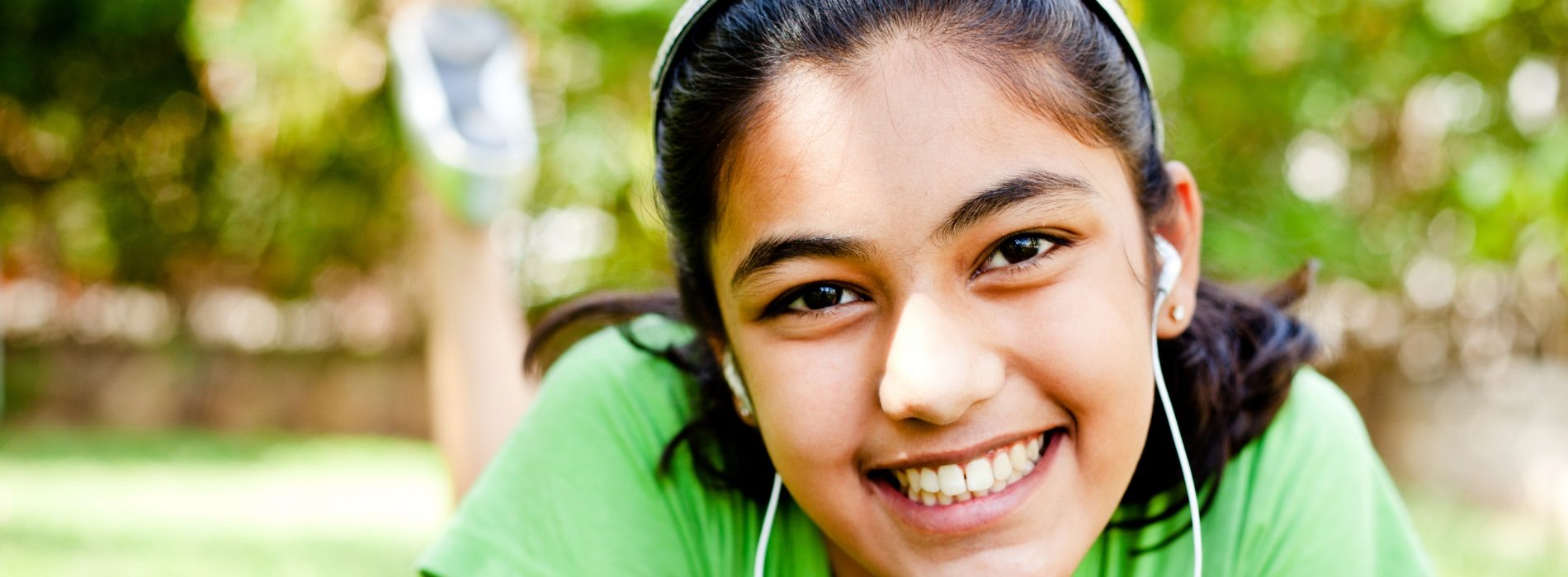 Smiling girl wearing headphones