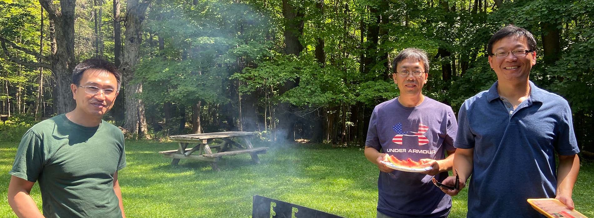 The UAlbany Asian Coalition of Professionals guests grilling outside