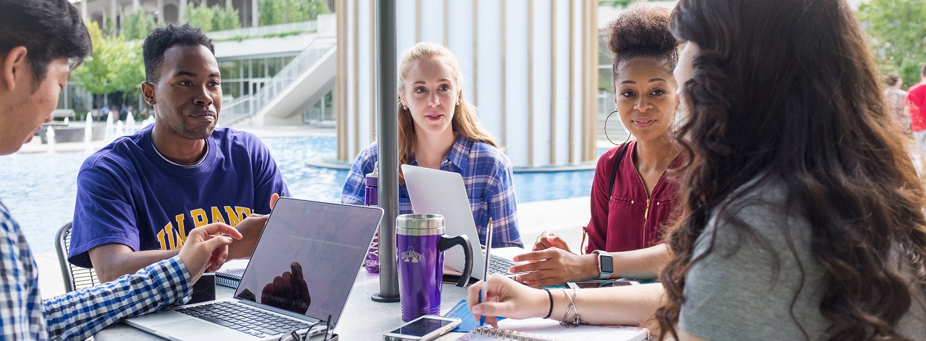 Students study on the Uptown campus