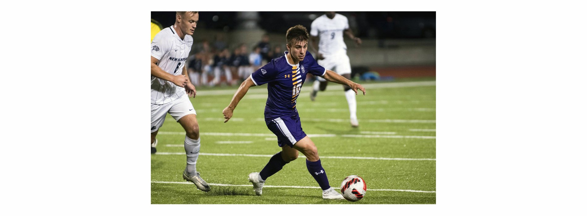 UAlbany's Giuliano Lucca dribbles the ball.