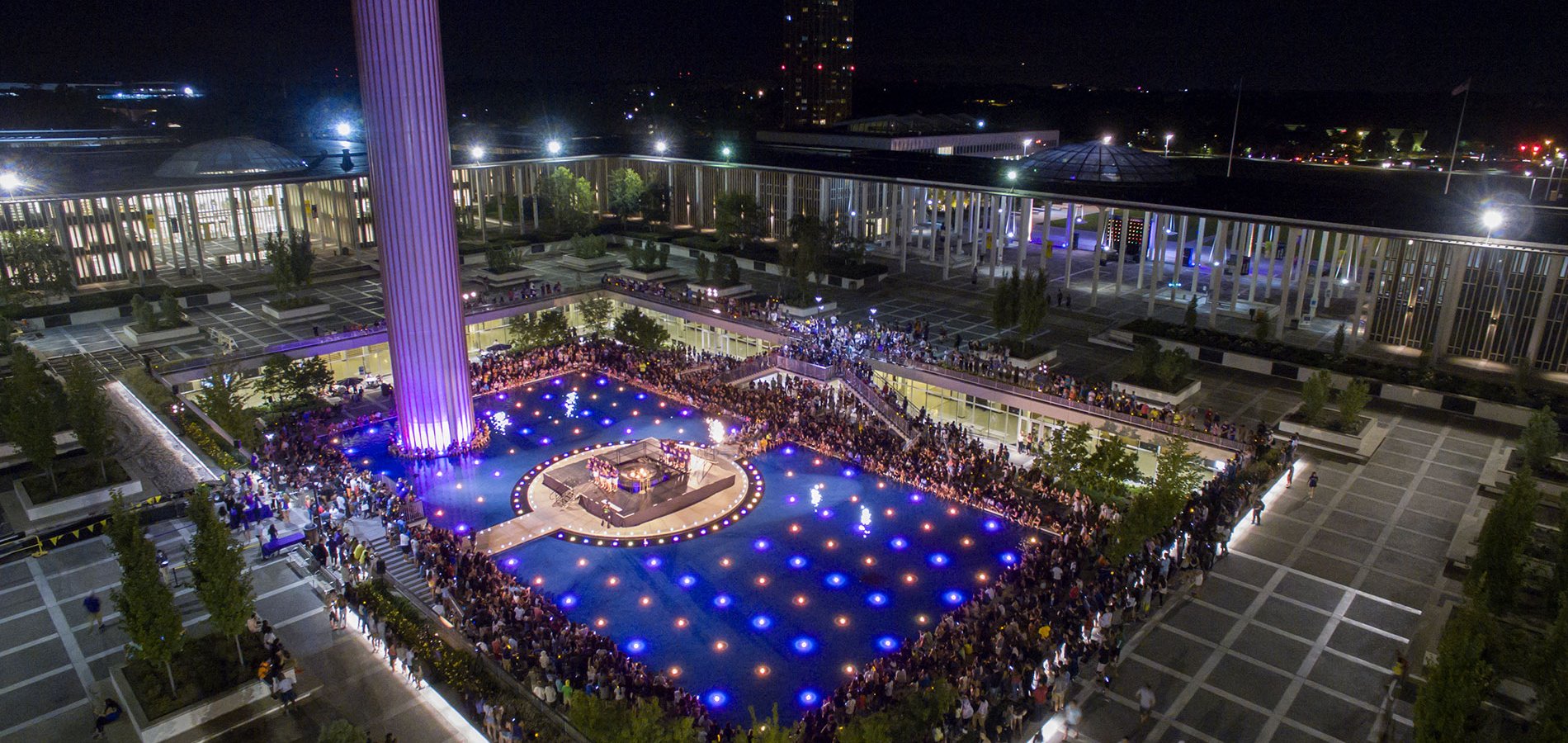 Event on campus, at night, at the main fountain