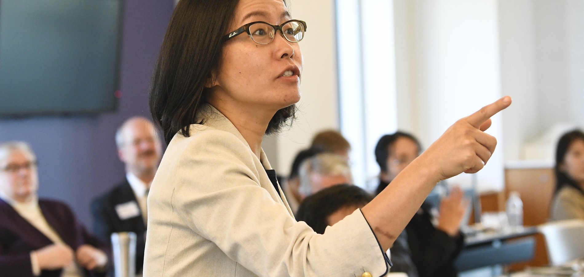 Prof Na Dai speaks at finance symposium