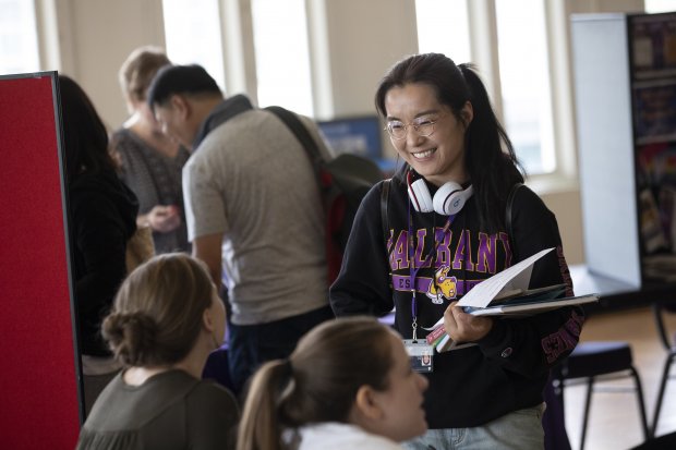 A student attends a resource fair on UAlbany's campus