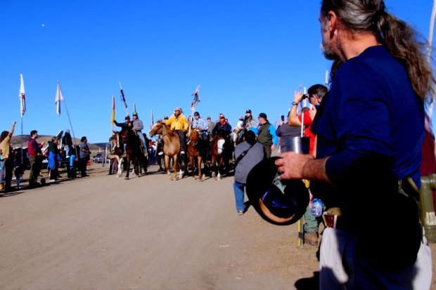 Indigenous activists in front of a vista