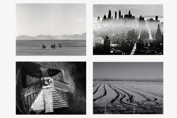 4 black and white photographs of landscapes including cities, desert, mountains