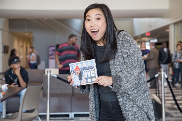 Rapper, actress and UAlbany alum Awkwafina poses with her book inside Campus Center during a signing event