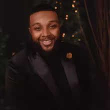 Headshot of a smiling Kiante Bush 