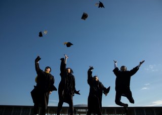 UAlbany students celebrating their graduation
