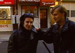 David Shapiro and Leeds Atkinson talk outside Lombardi's Pizzeria in downtown Manhattan.