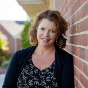 Dr. Rachel Adams Goertel smiling outside