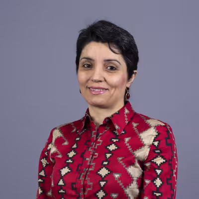 Dr. Lusine Ghazaryan smiles at the camera.