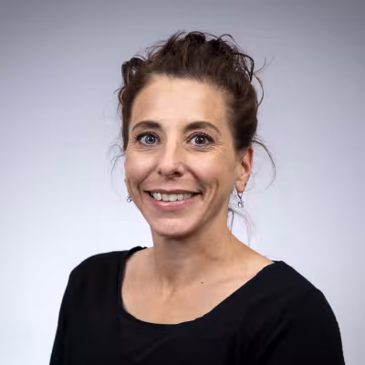 A portrait of Denise Kay.