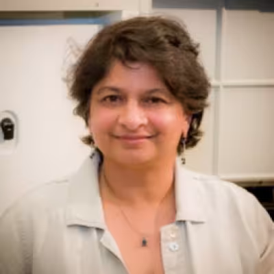 A portrait of Sudha Chaturvedi.