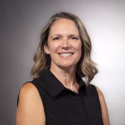 Dawn Bleyenburg with shoulder length hair and a black shirt