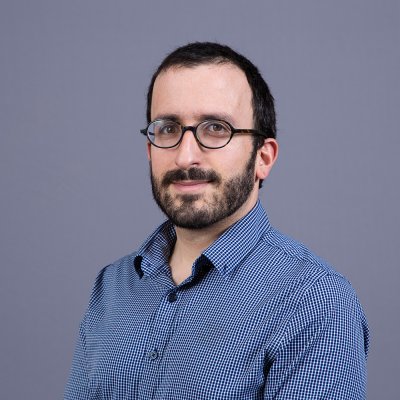 Dr. Rosenberg smiles at the camera.