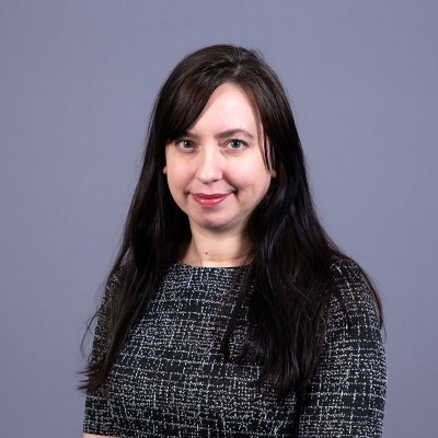 Dr. Melissa Tracy smiles at the camera.