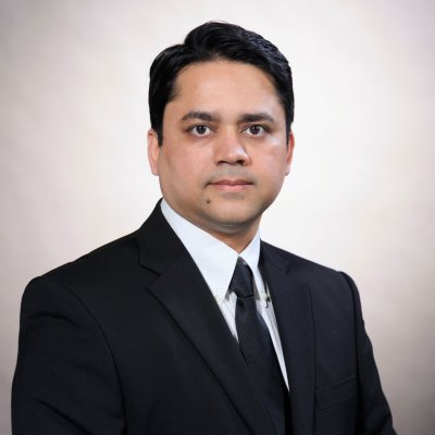 A portrait of Muntasir Masum.
