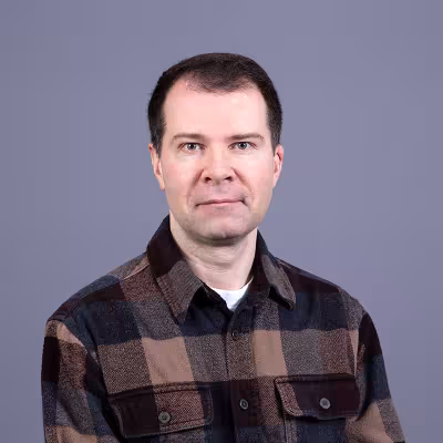 Dr. Igor Kuznetsov smiles at the camera.