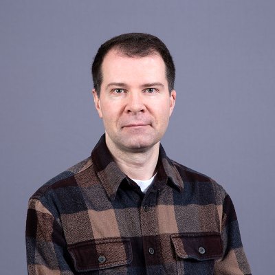 Dr. Igor Kuznetsov smiles at the camera.