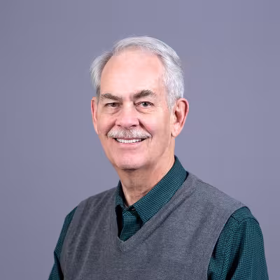 Dr. Smith smiles at the camera.
