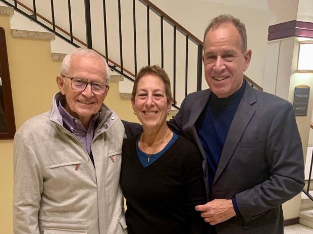 Smiling Nick Donofrio stands alongside smiling Caryn and Al Bunshaft. 